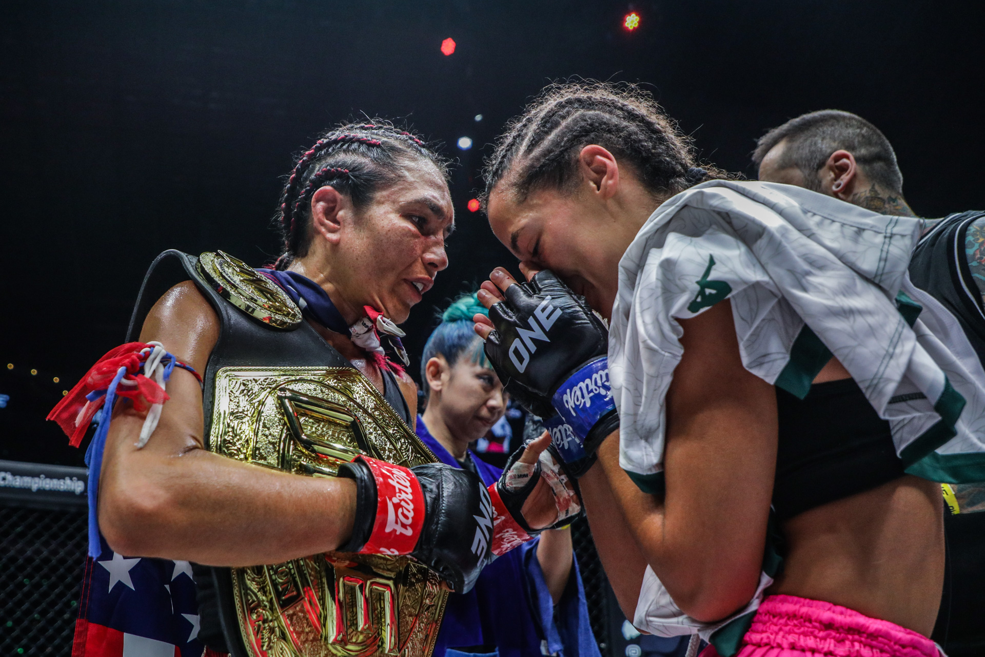 Janet Todd and Lara Fernandez pay respect after their match at ONE 159